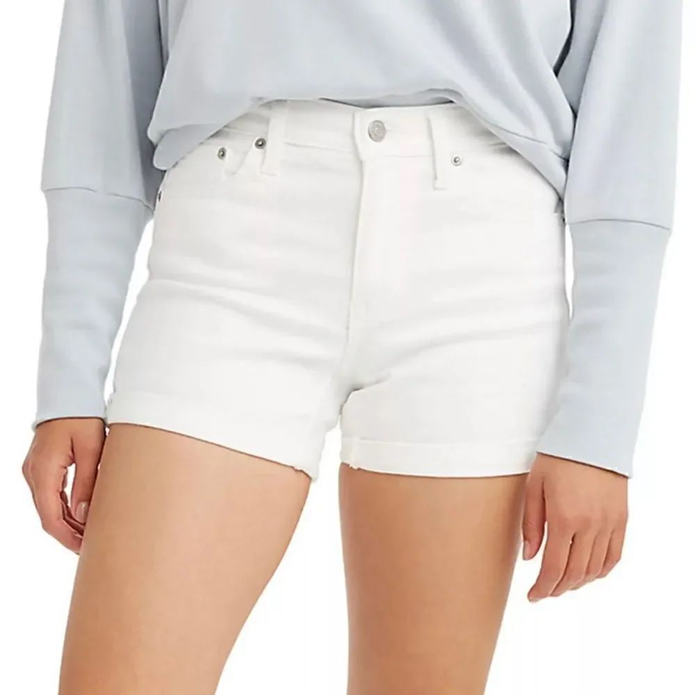 Levi’s mid length white jean shorts.  Size 26( 2)